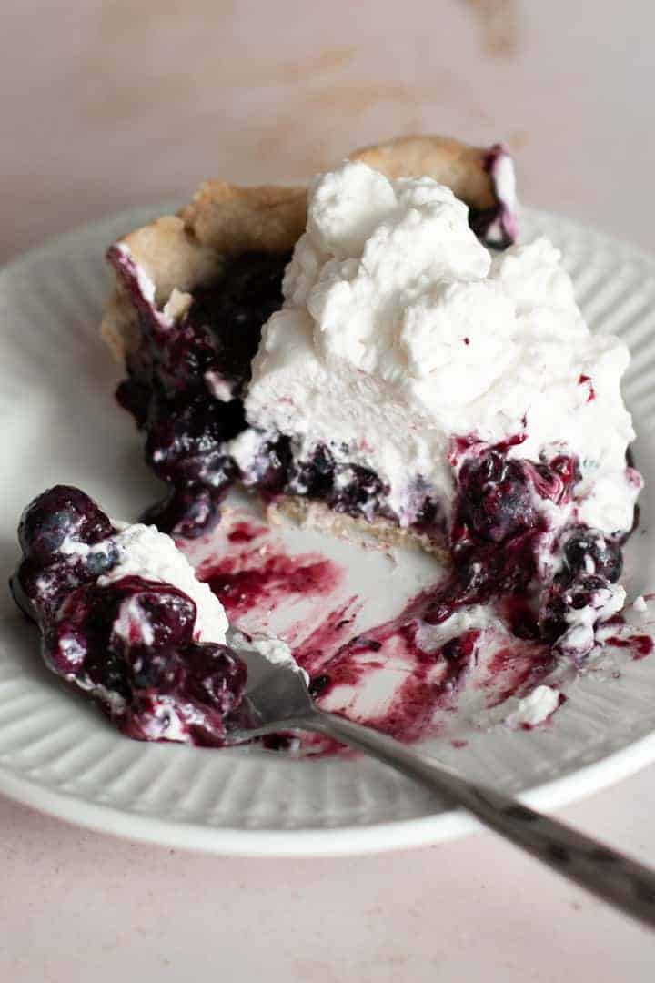 Maine blueberry pie with whipped cream